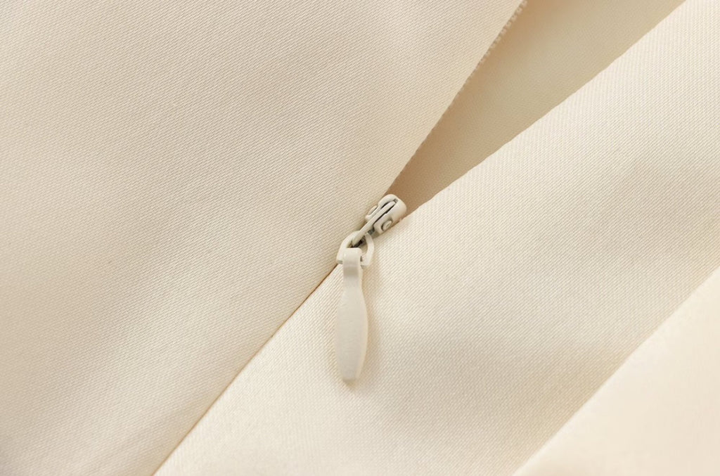 Ivory Bow Statement Mini Skirt | Satin